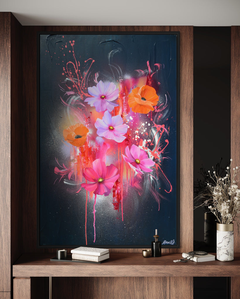 'Drama Tropicana' original painting on a cotton canvas by Jasmine Marshall, framed in black/oak. Features orange poppies and pink and purple flower on an abstract navy background and neon pink, featured in a neutral home interior.