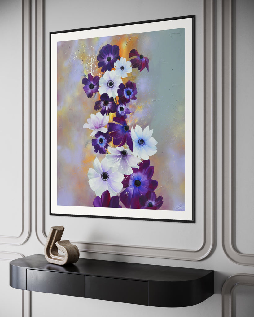 ‘Flourish' Fine Art Print by Jasmine Marshall, framed in black/oak. Premium Giclée print features white and purple anemone flowers on a grey and lilac abstract background, featured in a neutral home interior.