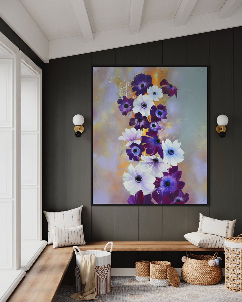 'Flourish' original painting on a cotton canvas by Jasmine Marshall, framed in black/oak. Features white and purple anemone flowers on a grey and lilac abstract background, featured in a neutral home interior.