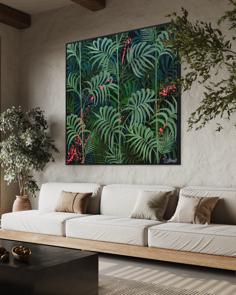 'Forever Green' original painting on a cotton canvas by Jasmine Marshall, framed in black/oak. Features layers of palm leaves on a black background with pops on neon pink.  Displayed in a neutral living room with trees and wooden ceiling beams..