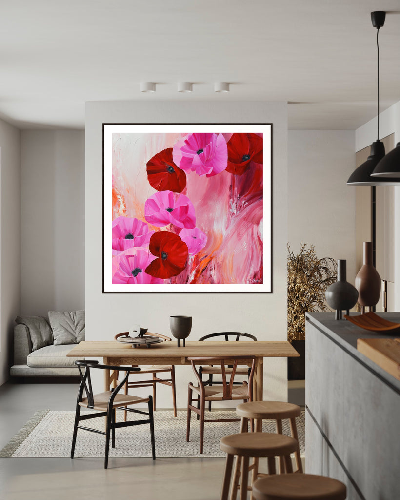 ‘It’s a Forever Thing' Fine Art Print by Jasmine Marshall, framed in black/oak. Premium Giclée print features pink and red poppies on an abstract background with pops of orange.  Displayed in a neutral kitchen.