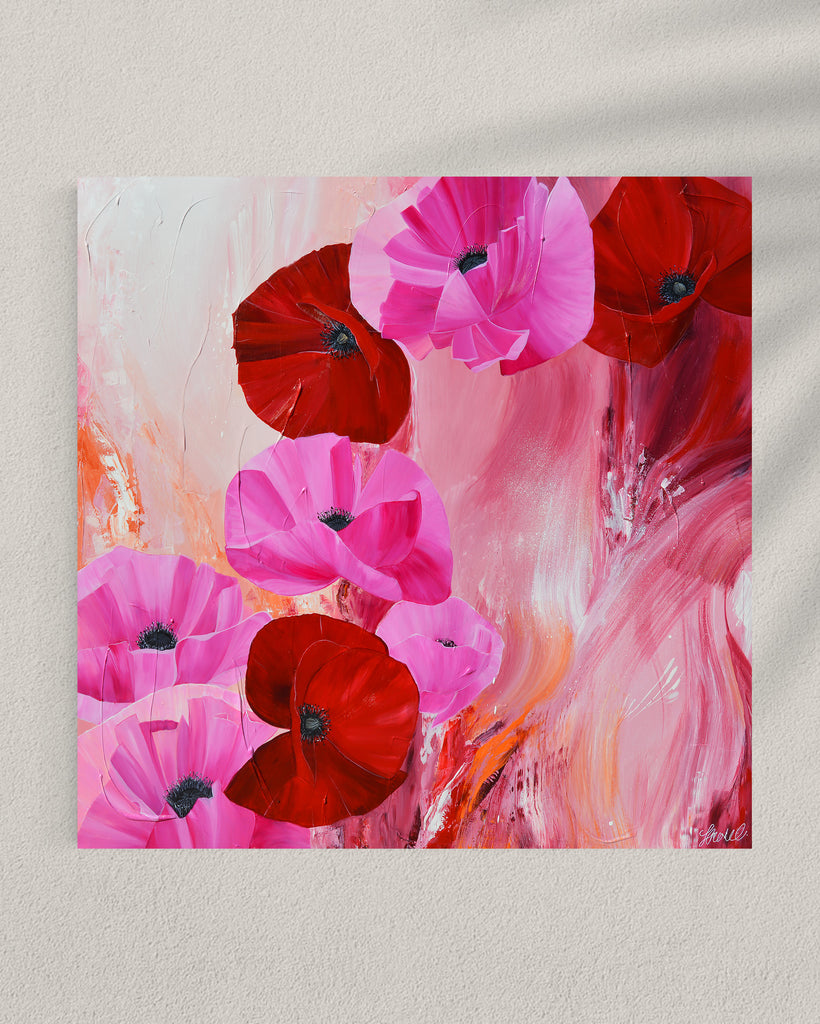 'It’s a Forever Thing' original painting on a cotton canvas by Jasmine Marshall, framed in black/oak. Features pink and red poppies on an abstract background with pops of orange. Displayed in a gallery.