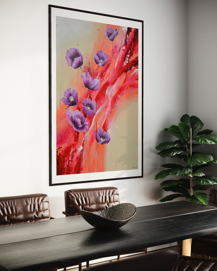 ‘Making Memories' Fine Art Print by Jasmine Marshall, framed in black/oak. Premium Giclée print features purple poppies on a cream and red abstract background.  Displayed in a neutral home interior with brown dining table and plant.