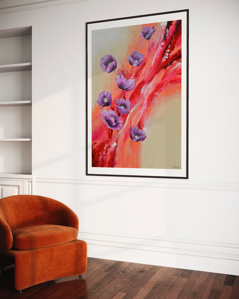 ‘Making Memories' Fine Art Print by Jasmine Marshall, framed in black/oak. Premium Giclée print features purple poppies on a cream and red abstract background.  Displayed in a neutral home interior with orange velvet chair.