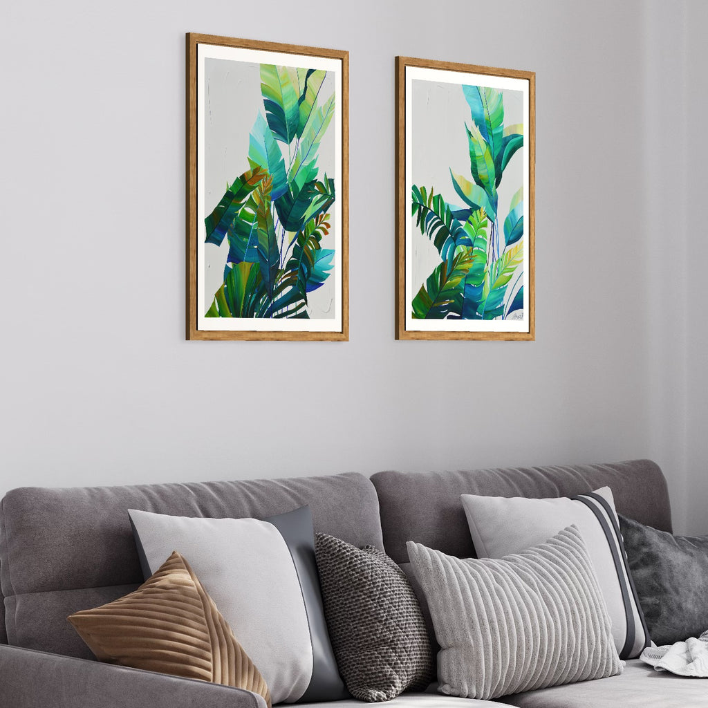 Tropic duo fine art prints by Jasmine Marshall in oak frames in a living room. Featuring green leaves