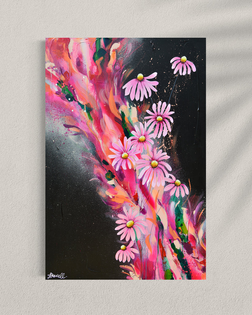 'The Laughter of Daisies' original painting on a cotton canvas by Jasmine Marshall, framed in black/oak. Features pink daises on a colourful abstract details on a black background. Displayed in a gallery.