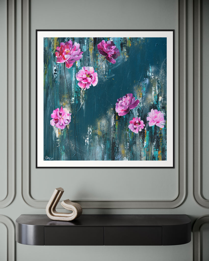 ‘The Other Side' Fine Art Print by Jasmine Marshall, framed in black/oak. Premium Giclée print features pink peonies on a teal background. Displayed in a neutral home interior.