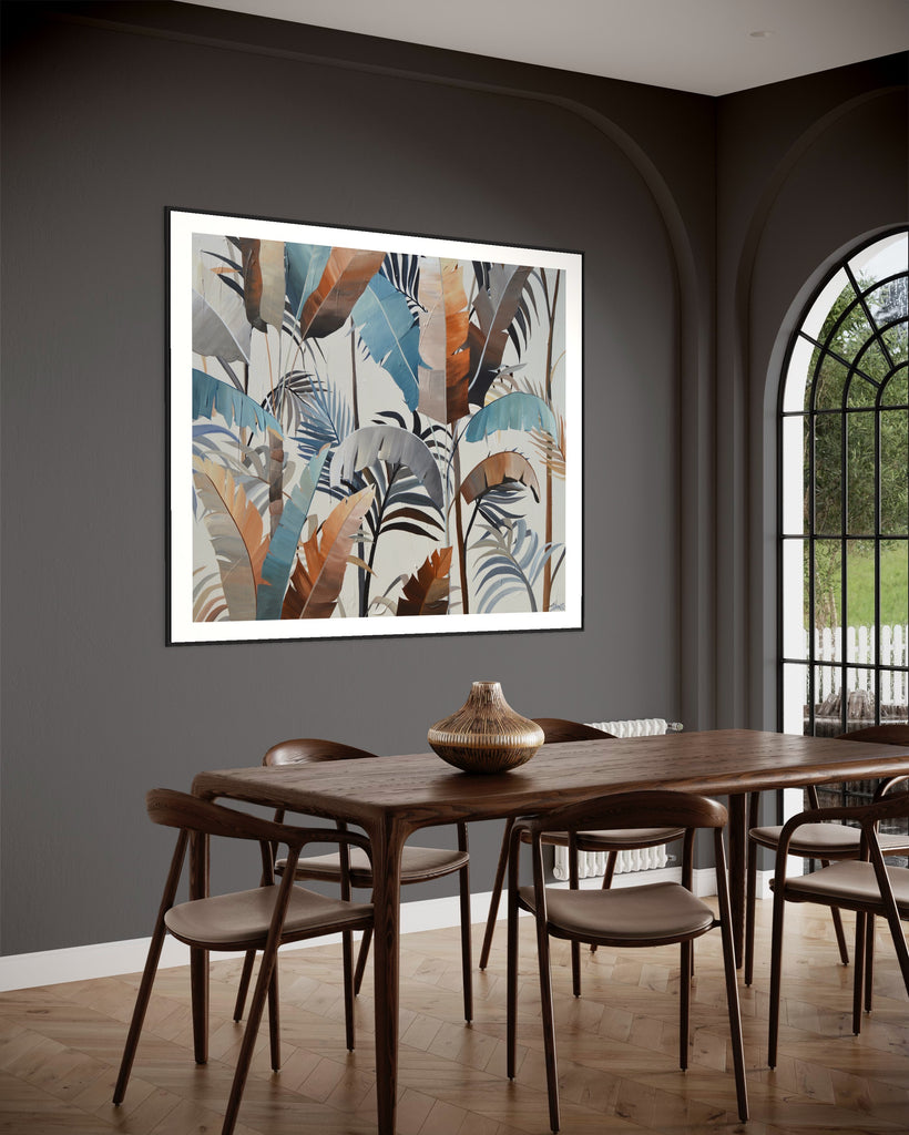 ‘Virgin Forest' Fine Art Print by Jasmine Marshall, framed in black/oak. Premium Giclée print features brown, blue, black leaves on a neutral background. Displayed in grey dining room with a wooden table and glass doors.