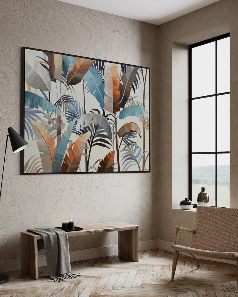 'Virgin Forest’ original painting on a cotton canvas by Jasmine Marshall, framed in black/oak. Features brown, blue, black leaves on a neutral background. Displayed in a neutral home interior.